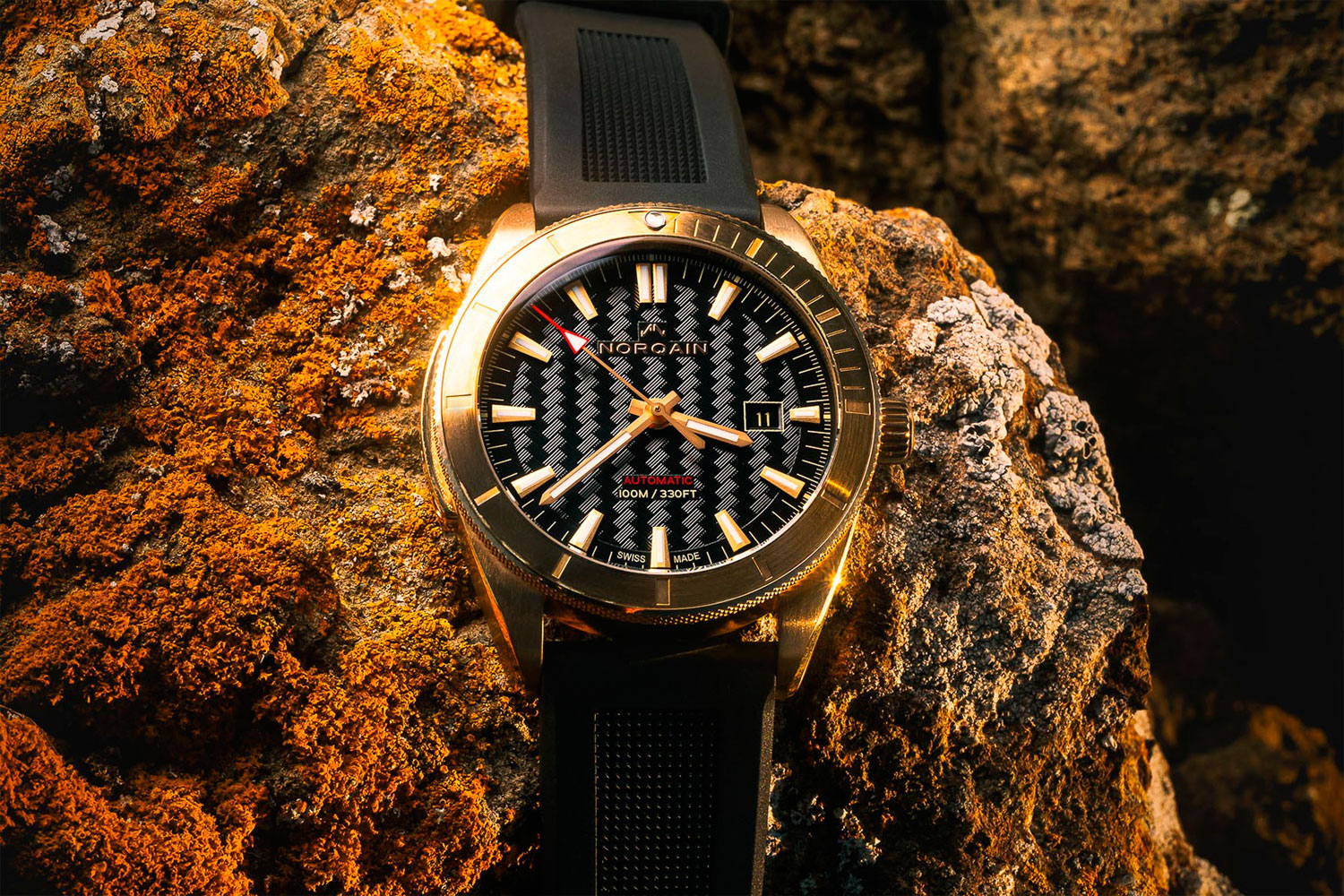 エストネーション Тёплый металл заката: Norqain Adventure Sport Golden Hour 42 мм